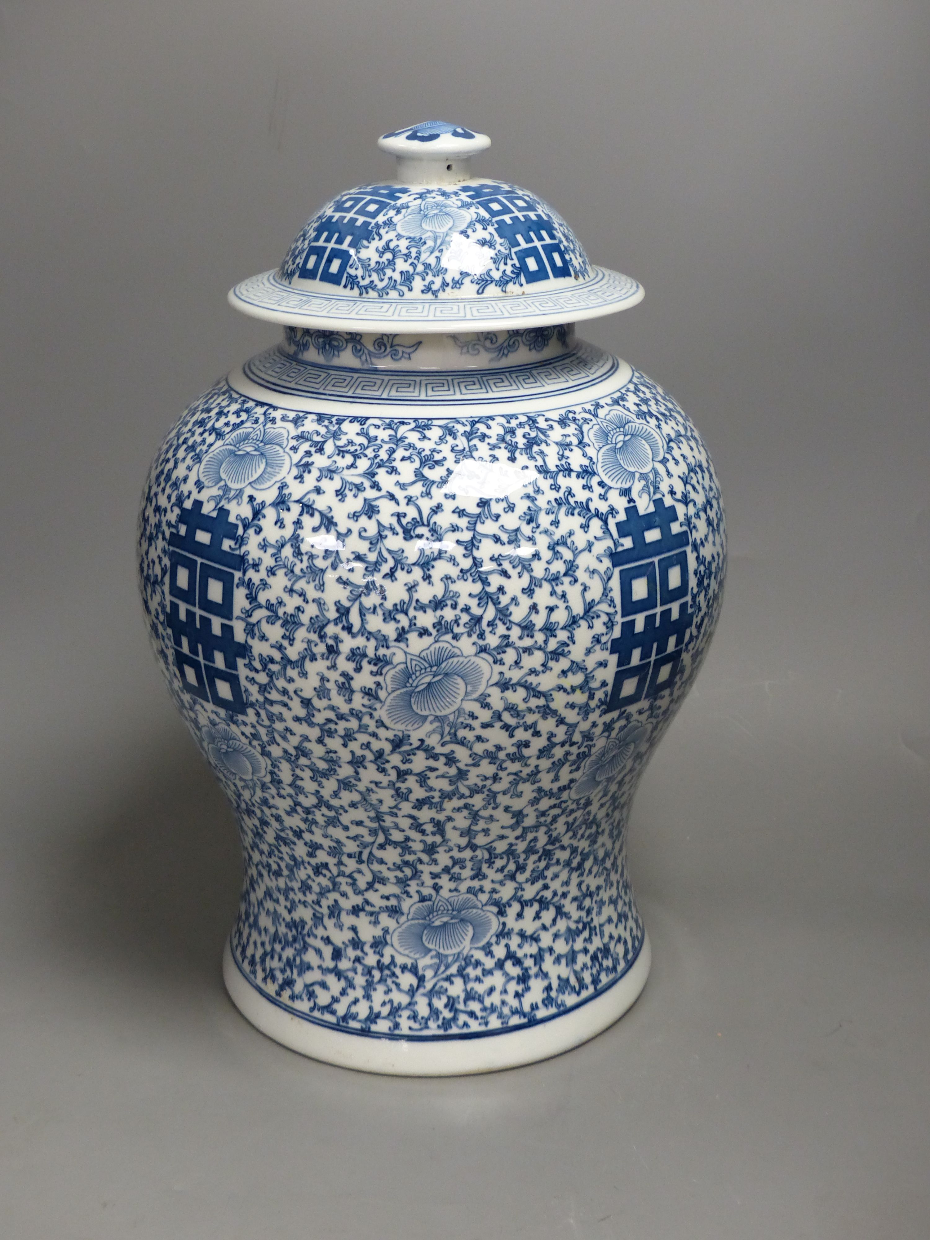 A large 20th century Chinese blue and white Shuangxi baluster vase and cover, height 32cm